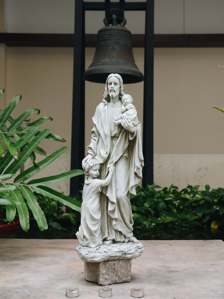 Statue of Jesus holding a child